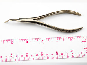 Curved Needle Holder. Unmarked.