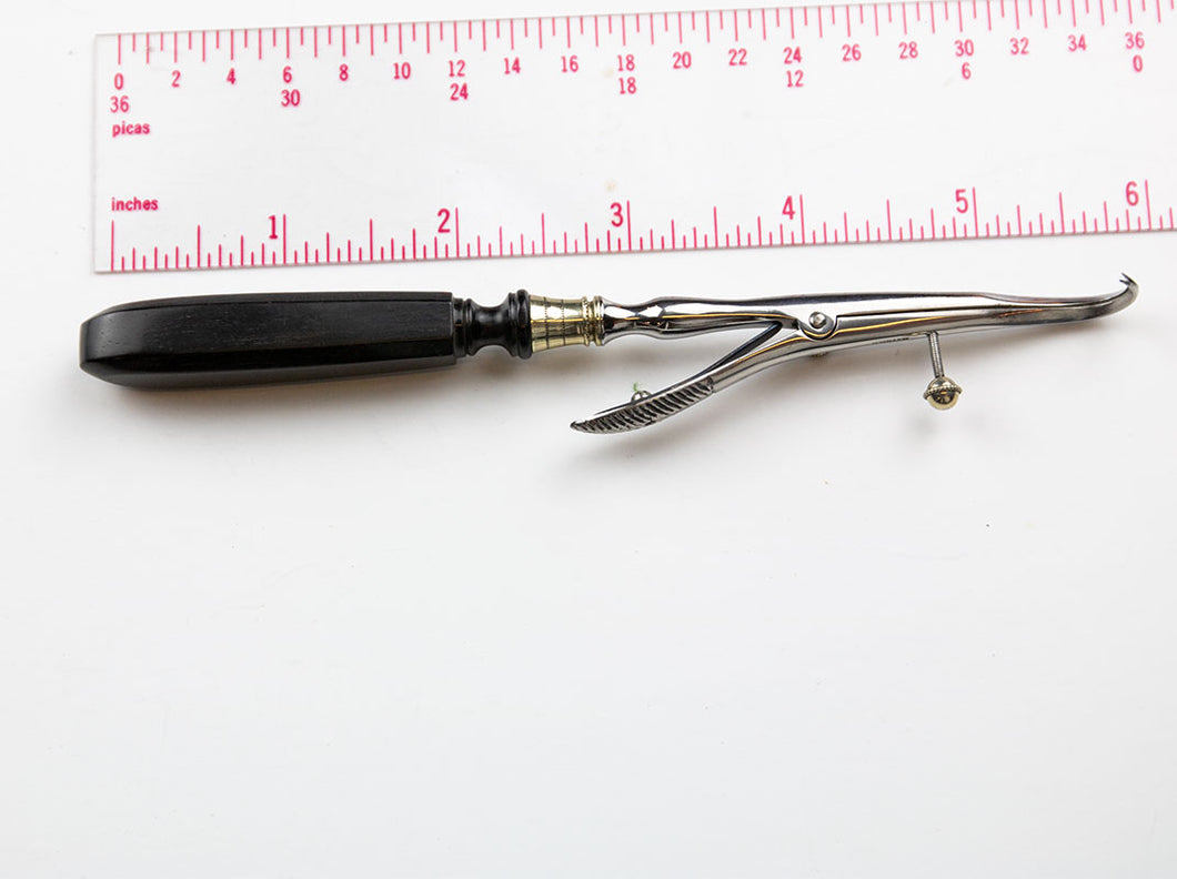 Unusual Spreading Tenaculum which can be locked open with set screw