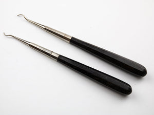 Pair of Unmarked Dental Instruments